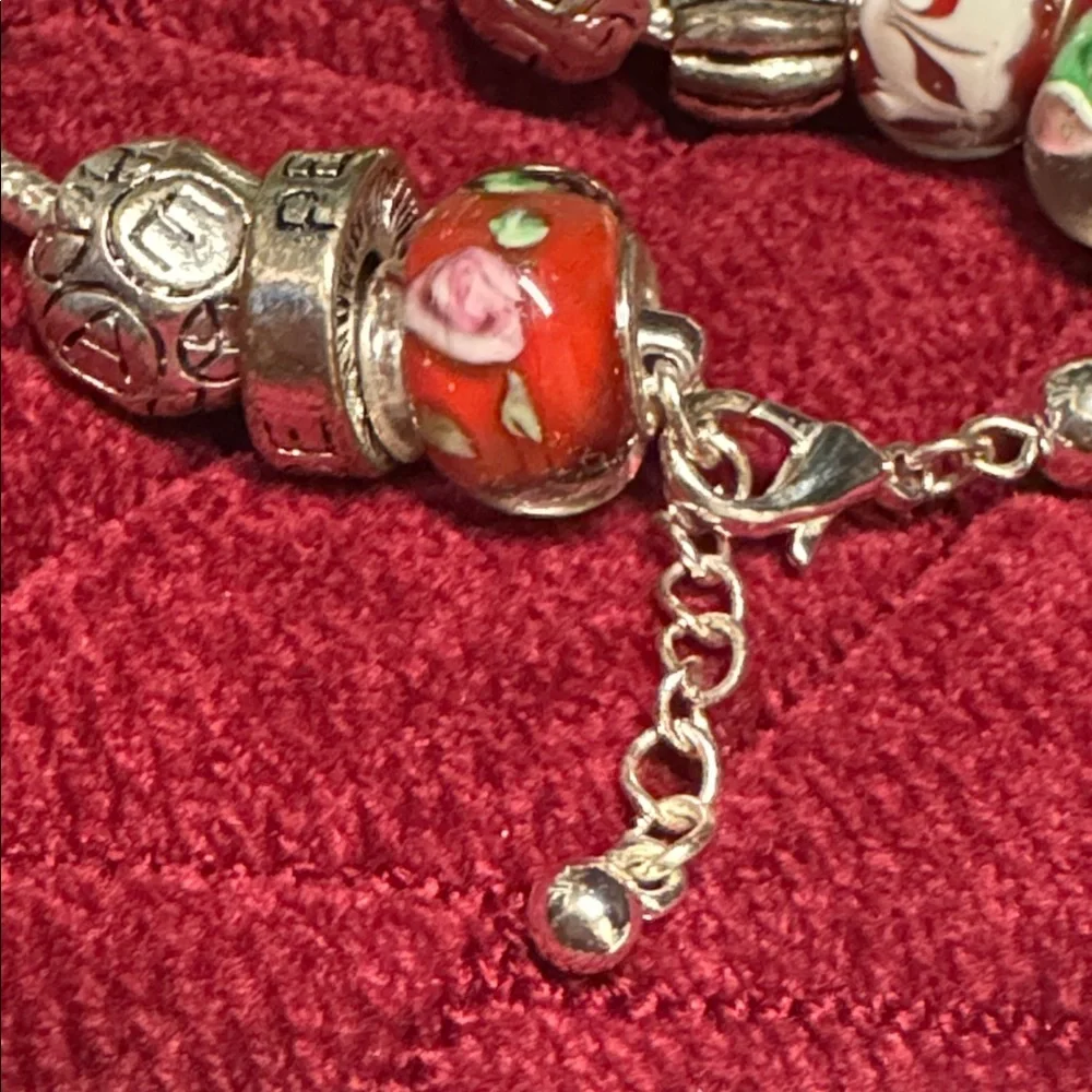 2 glass Bead and Elegant Silver Bracelets. In great condition.